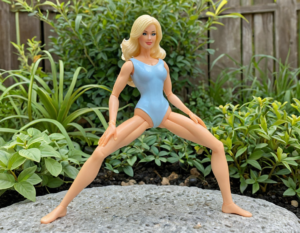 Action Woman posing naked doing yoga